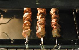 Pork shish kebab on onion bed