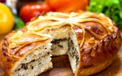 Appetizing puff pastry pies with chicken and other ingredients